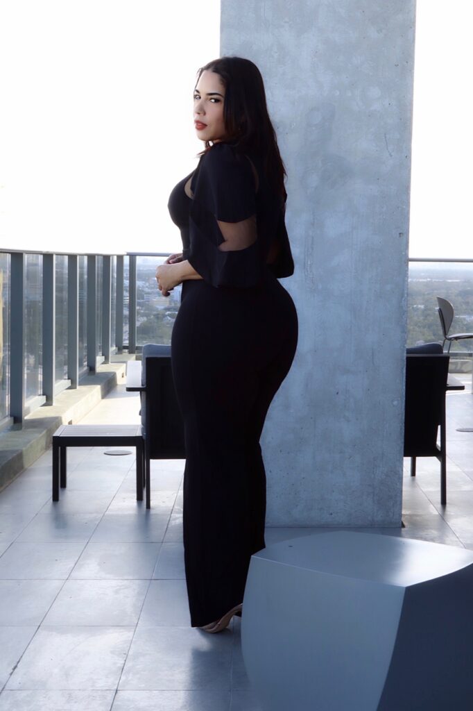 Mesh Contrast Mock-Neck Flared Leg Jumpsuit