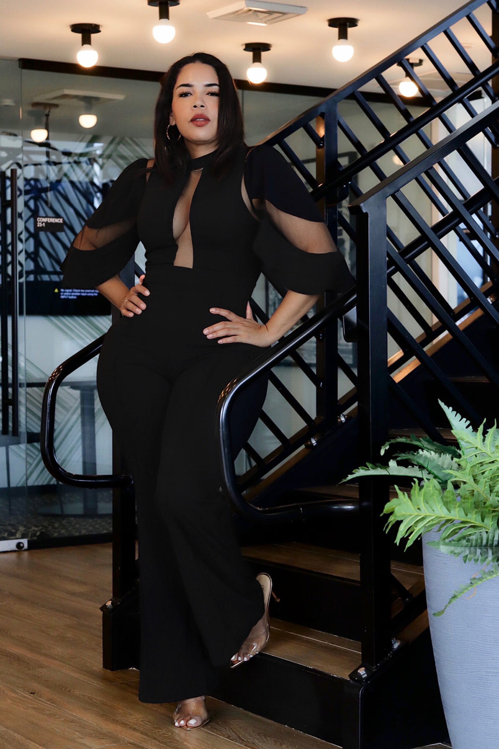 Mesh Contrast Mock-Neck Flared Leg Jumpsuit